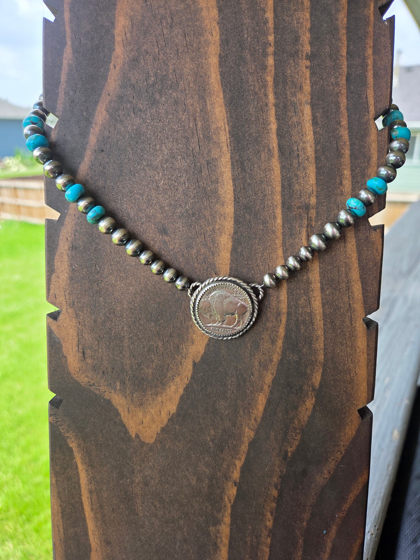 Buffalo Coin • Kingsmen Turquoise • Sterling Silver Navajo Style Pearl