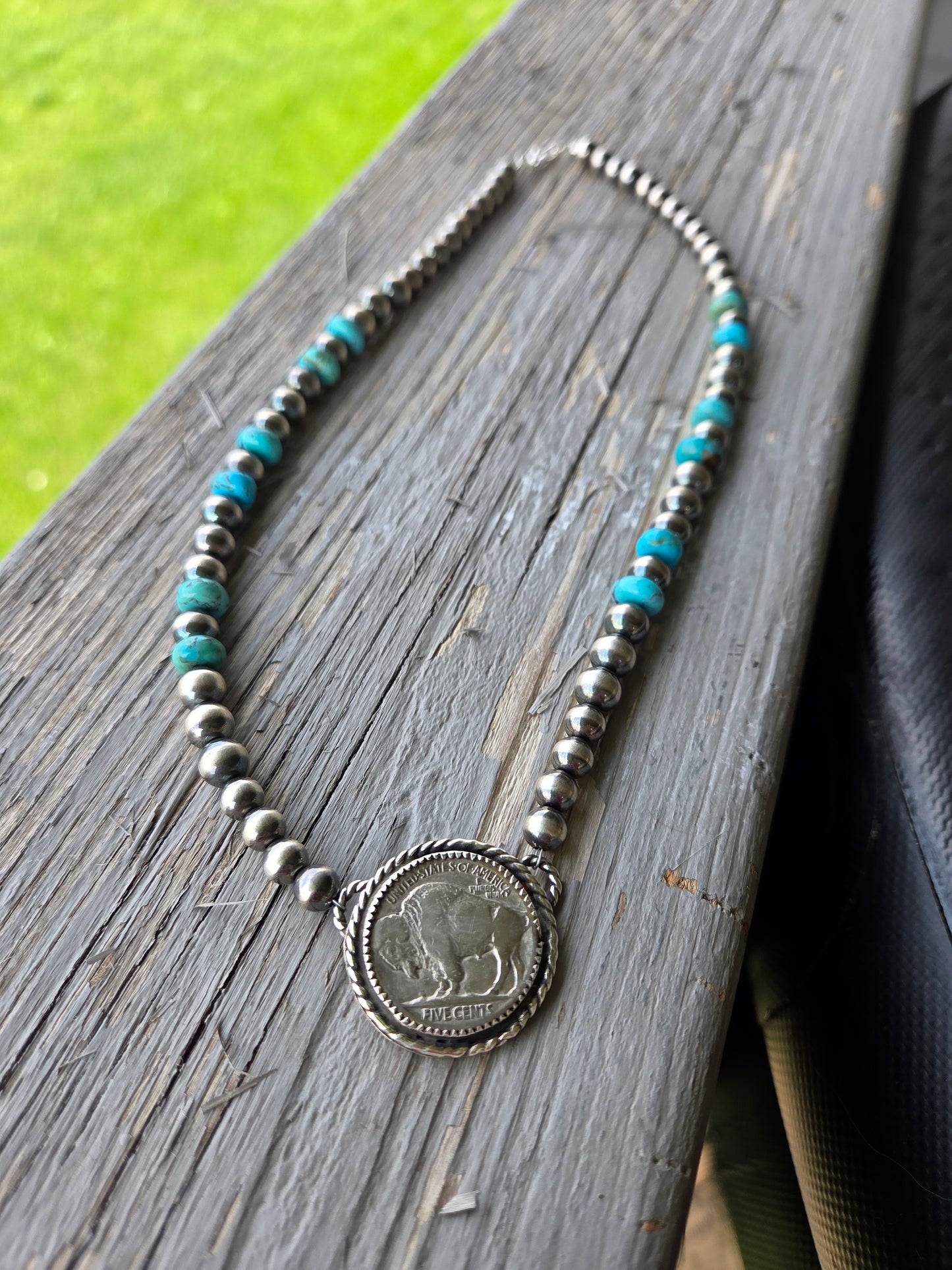 Buffalo Coin • Kingsmen Turquoise • Sterling Silver Navajo Style Pearl