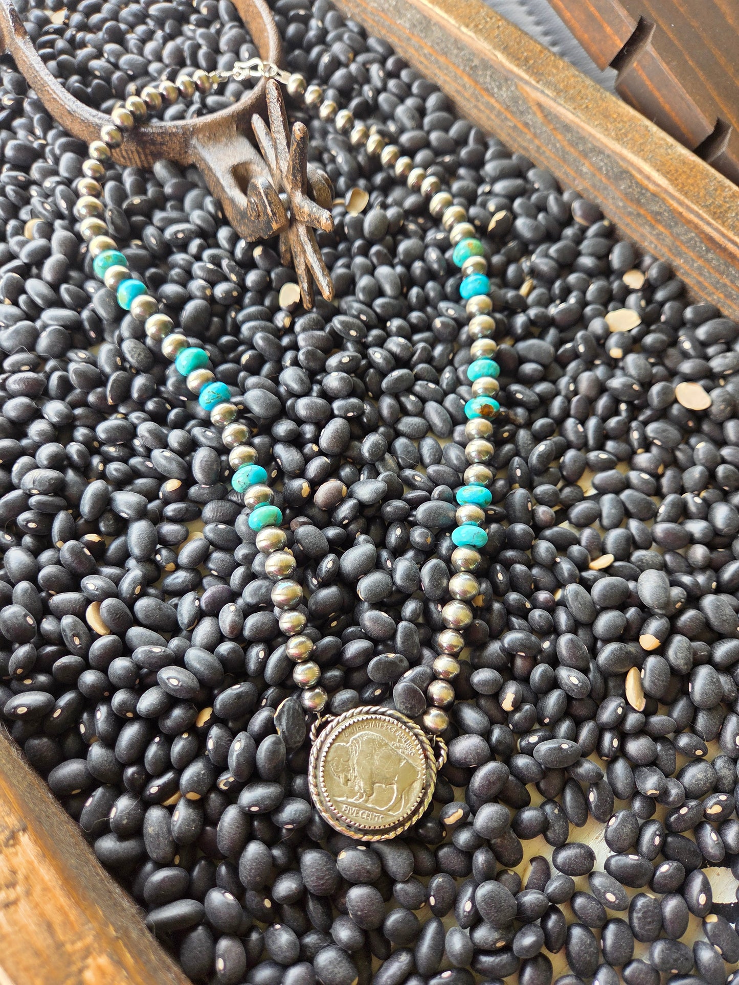 Buffalo Coin • Kingsmen Turquoise • Sterling Silver Navajo Style Pearl