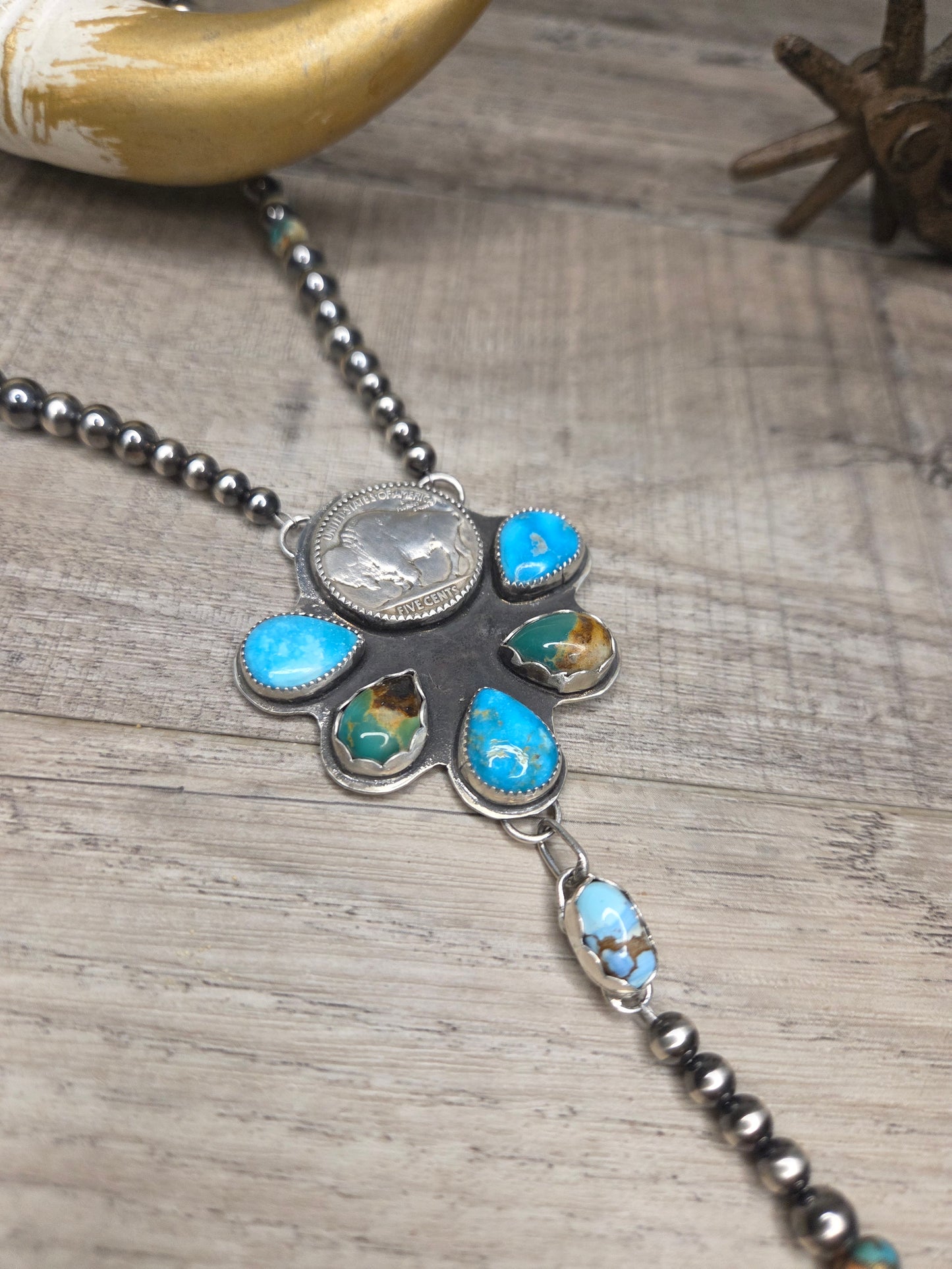 Buffalo Coin• Blue Bird Turquoise • Kingsmen Turquoise • Golden Hills Turquoise. Sterling Pearls & Spiny Oyster Kingsmen