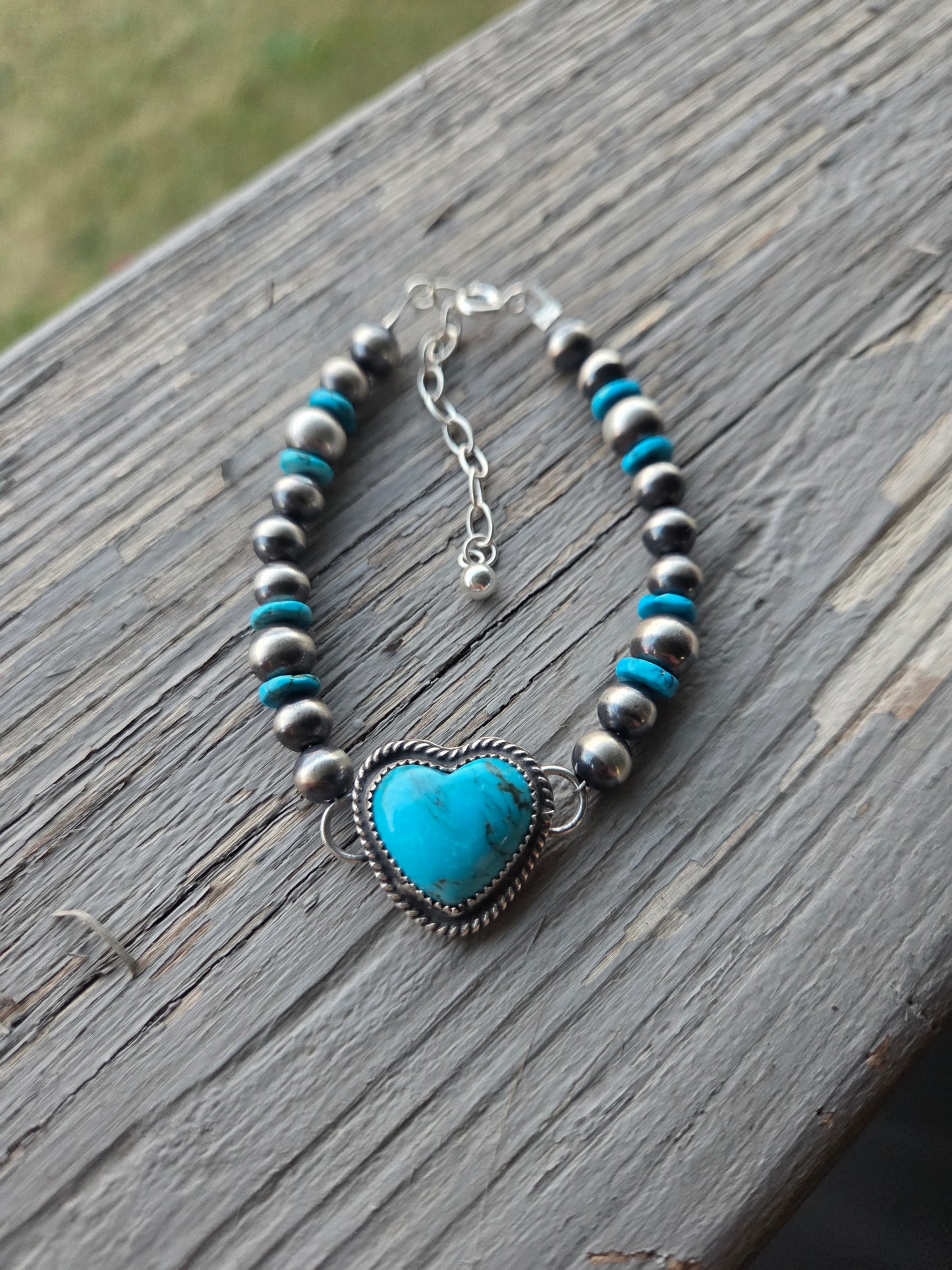 Kingsmen Heart •Sterling Silver Navajo Style Pearl • Turquoise Sterling Silver Adjustable clasp.  fits size 6.25-8