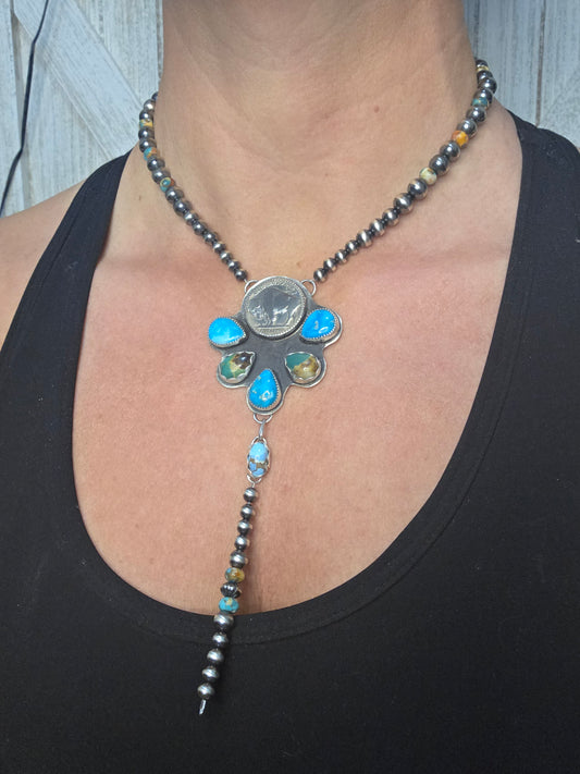 Buffalo Coin• Blue Bird Turquoise • Kingsmen Turquoise • Golden Hills Turquoise. Sterling Pearls & Spiny Oyster Kingsmen