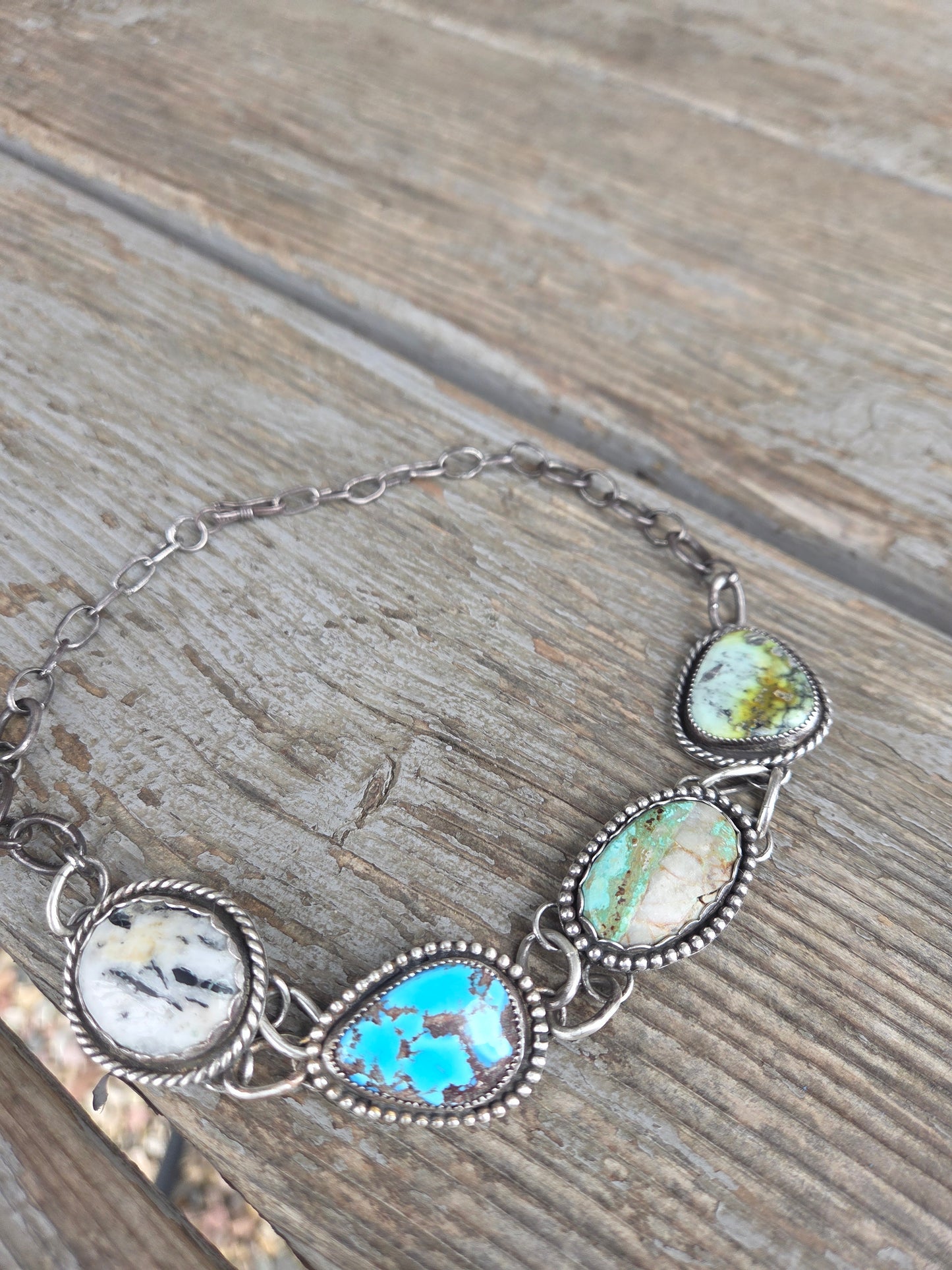 Choker• Golden Hills• Palomino • Boulder Turquoise• White Buffalo • Adjustable up to 15 inches. There is a small Crack in the bolder stone.