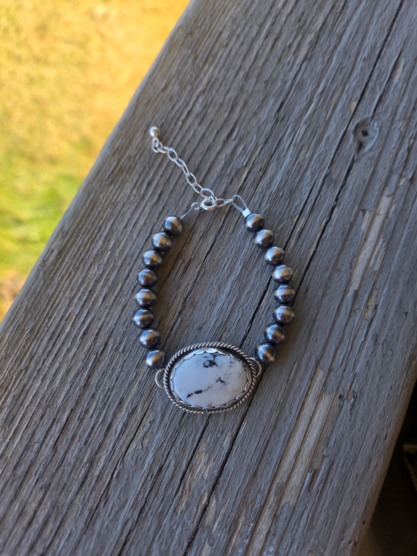 White Buffalo •Sterling Silver Navajo Style Pearl • Turquoise Sterling Silver Adjustable clasp.  fits size 6-8