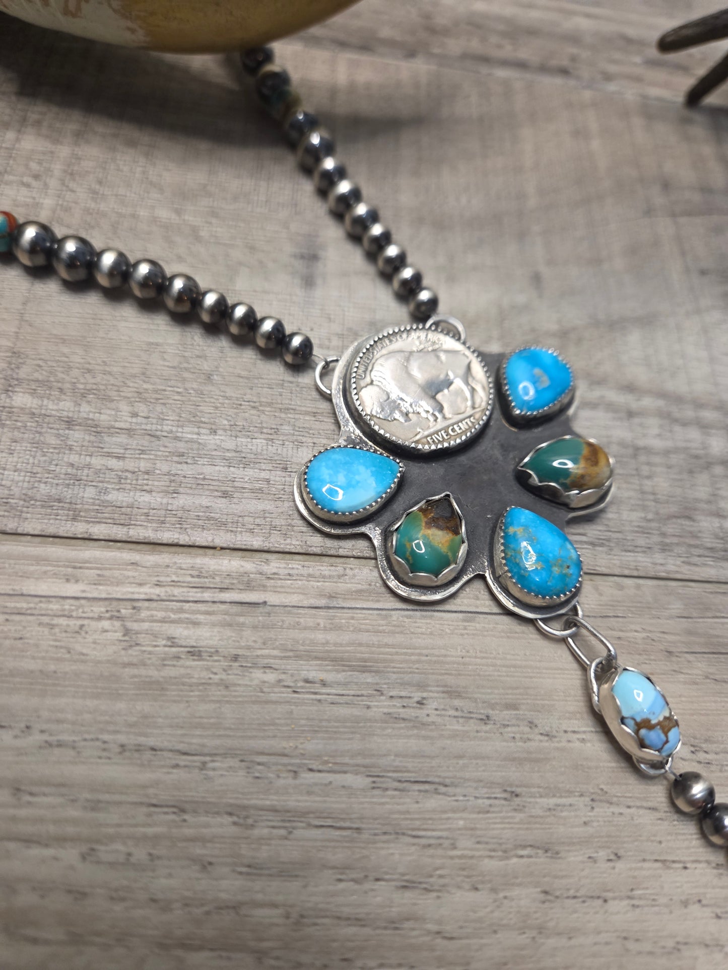 Buffalo Coin• Blue Bird Turquoise • Kingsmen Turquoise • Golden Hills Turquoise. Sterling Pearls & Spiny Oyster Kingsmen