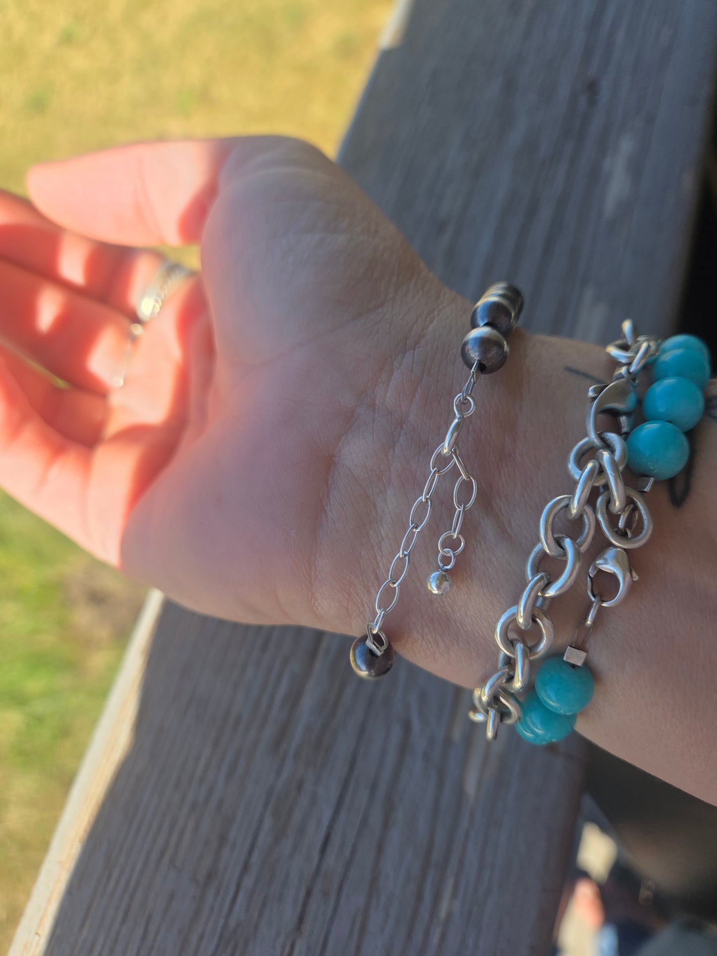 White Buffalo •Sterling Silver Navajo Style Pearl • Turquoise Sterling Silver Adjustable clasp.  fits size 6-8