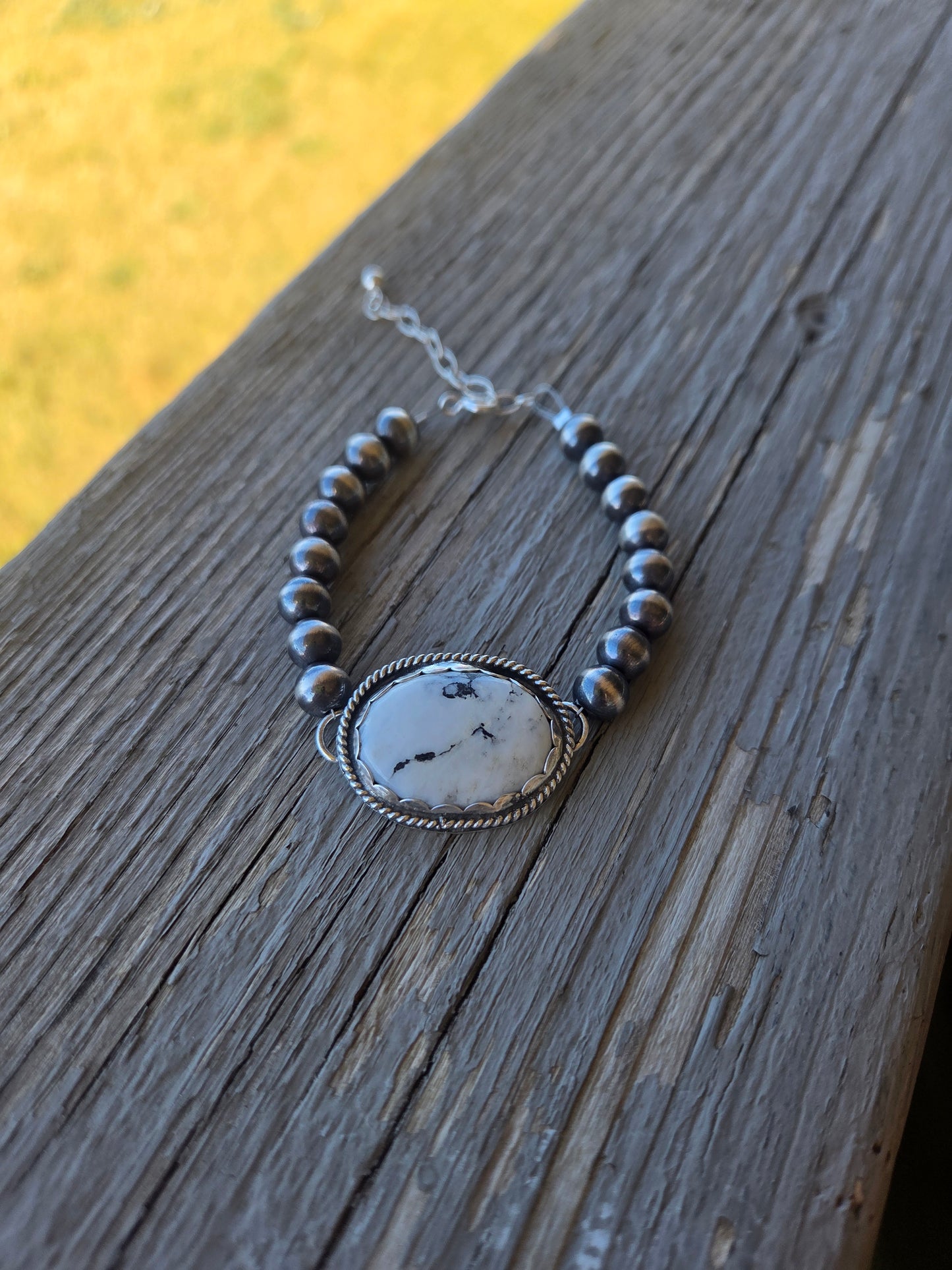 White Buffalo •Sterling Silver Navajo Style Pearl • Turquoise Sterling Silver Adjustable clasp.  fits size 6-8