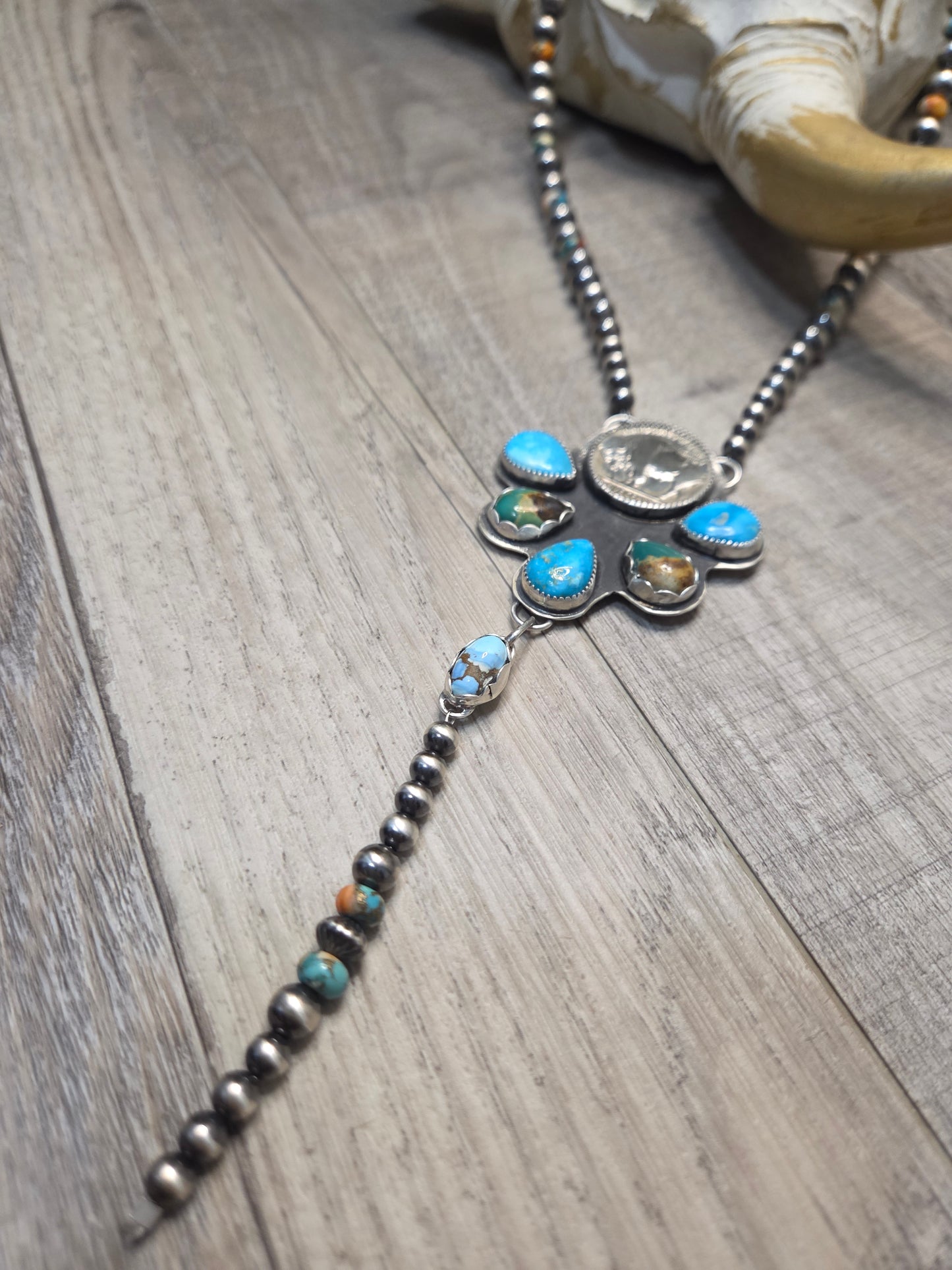 Buffalo Coin• Blue Bird Turquoise • Kingsmen Turquoise • Golden Hills Turquoise. Sterling Pearls & Spiny Oyster Kingsmen