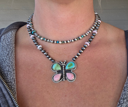 Pink & Sonoran Turquoise. Sterling and Pink Conch Stone beads.  17.5 inches