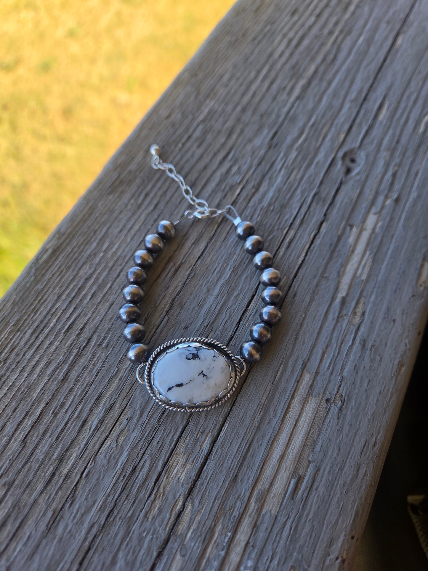 White Buffalo •Sterling Silver Navajo Style Pearl • Turquoise Sterling Silver Adjustable clasp.  fits size 6-8