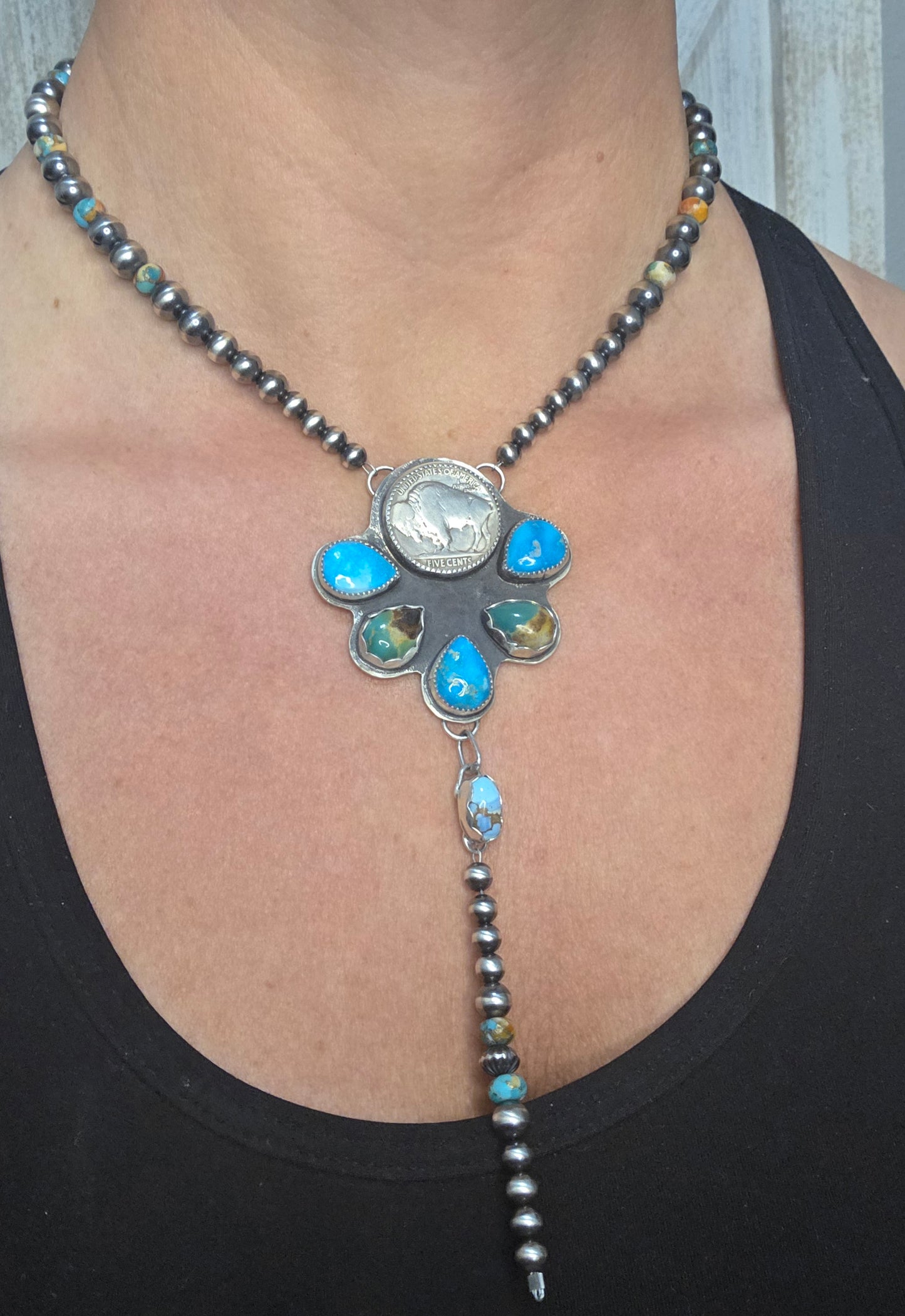Buffalo Coin• Blue Bird Turquoise • Kingsmen Turquoise • Golden Hills Turquoise. Sterling Pearls & Spiny Oyster Kingsmen