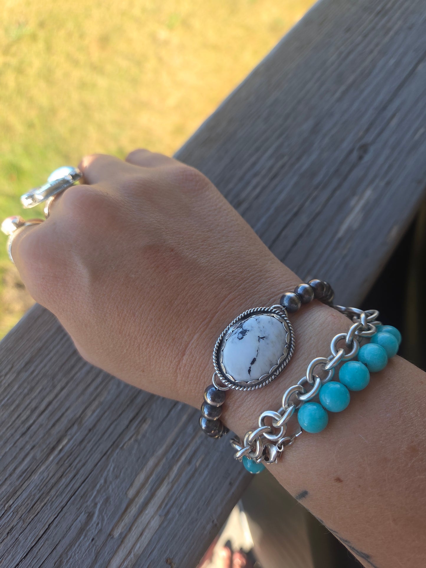 White Buffalo •Sterling Silver Navajo Style Pearl • Turquoise Sterling Silver Adjustable clasp.  fits size 6-8