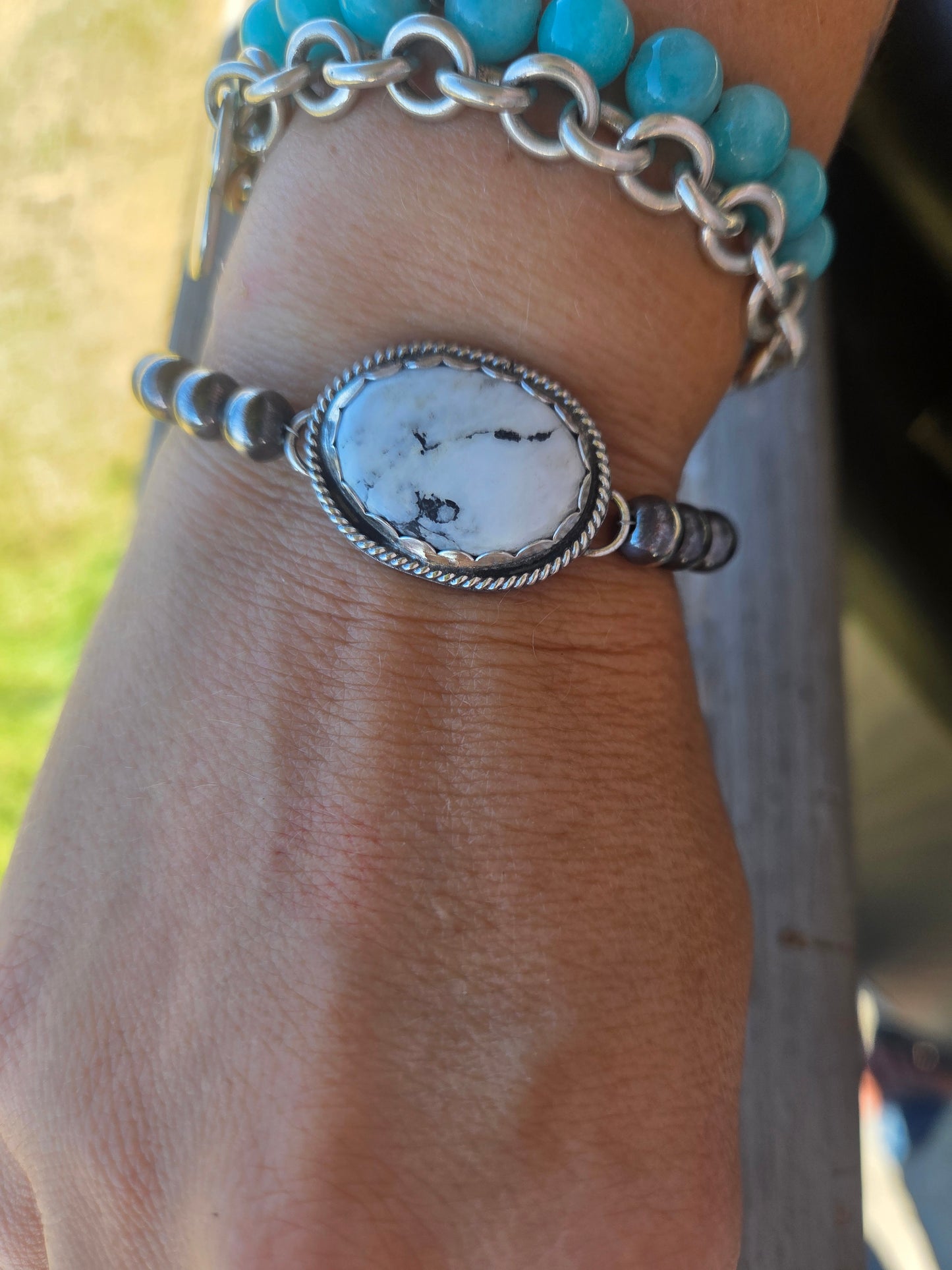 White Buffalo •Sterling Silver Navajo Style Pearl • Turquoise Sterling Silver Adjustable clasp.  fits size 6-8