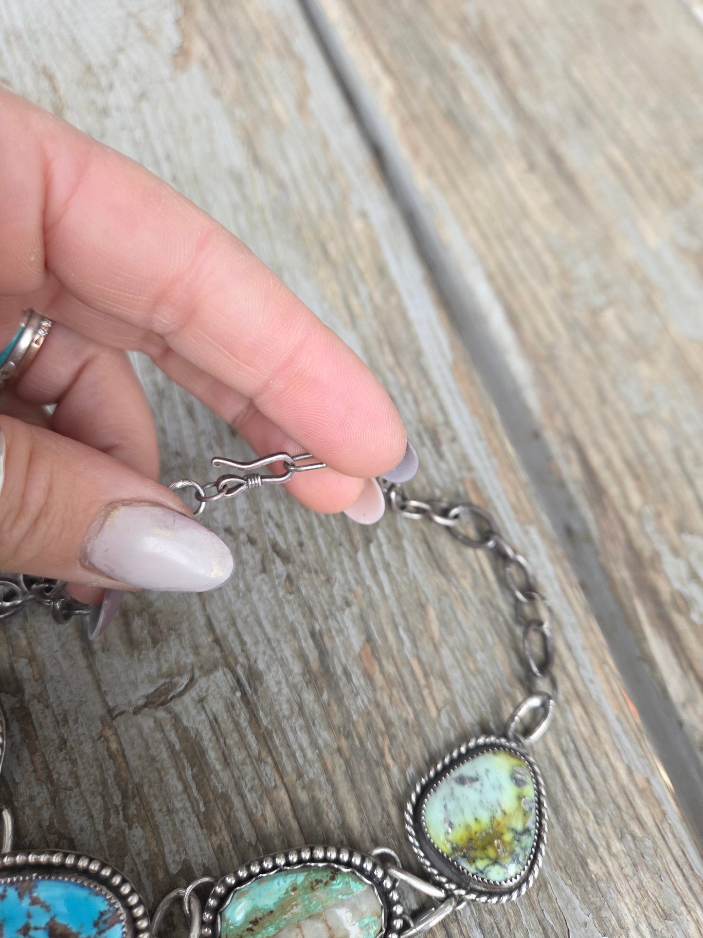 Choker• Golden Hills• Palomino • Boulder Turquoise• White Buffalo • Adjustable up to 15 inches. There is a small Crack in the bolder stone.