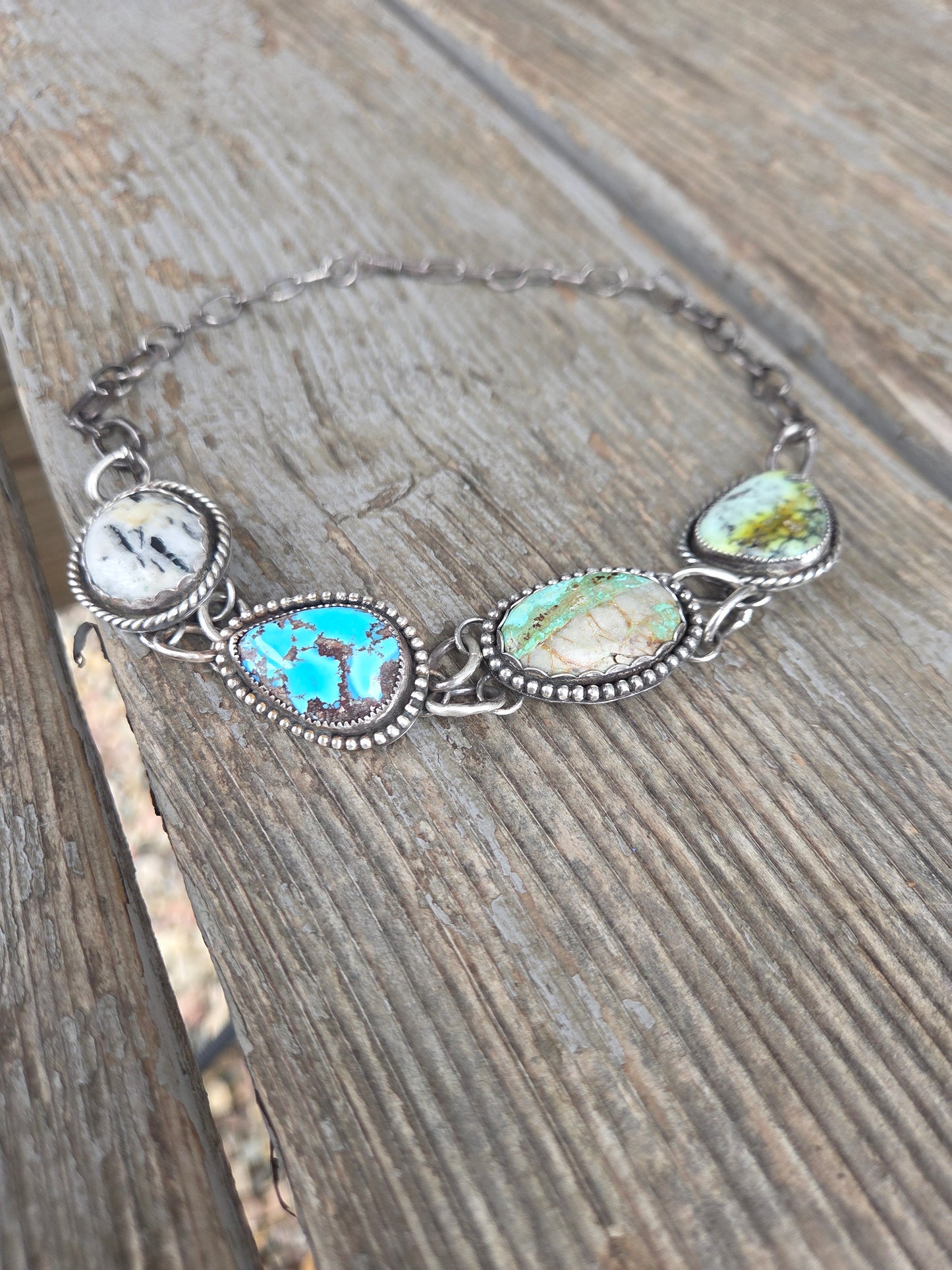 Choker• Golden Hills• Palomino • Boulder Turquoise• White Buffalo • Adjustable up to 15 inches. There is a small Crack in the bolder stone.