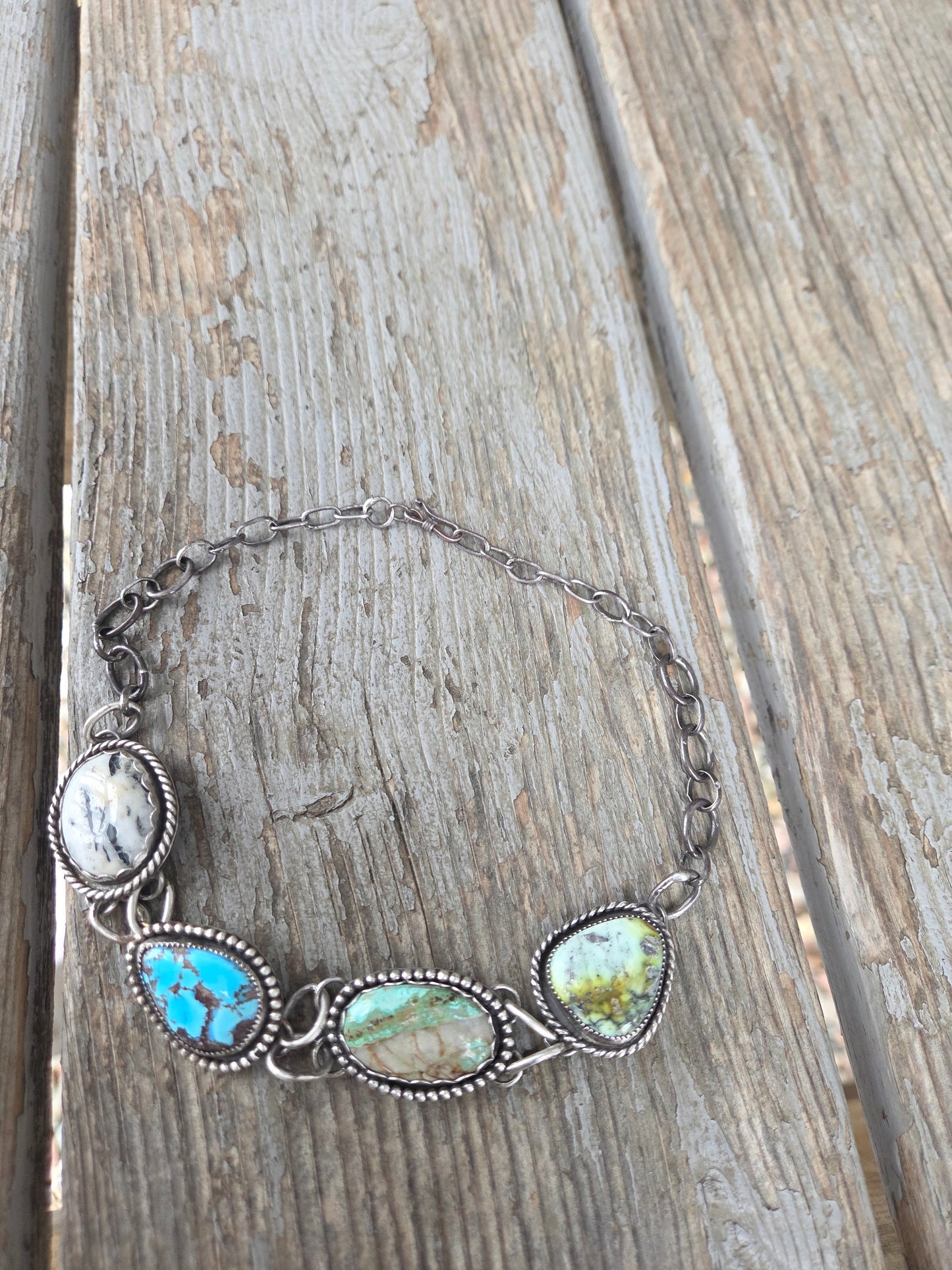 Choker• Golden Hills• Palomino • Boulder Turquoise• White Buffalo • Adjustable up to 15 inches. There is a small Crack in the bolder stone.