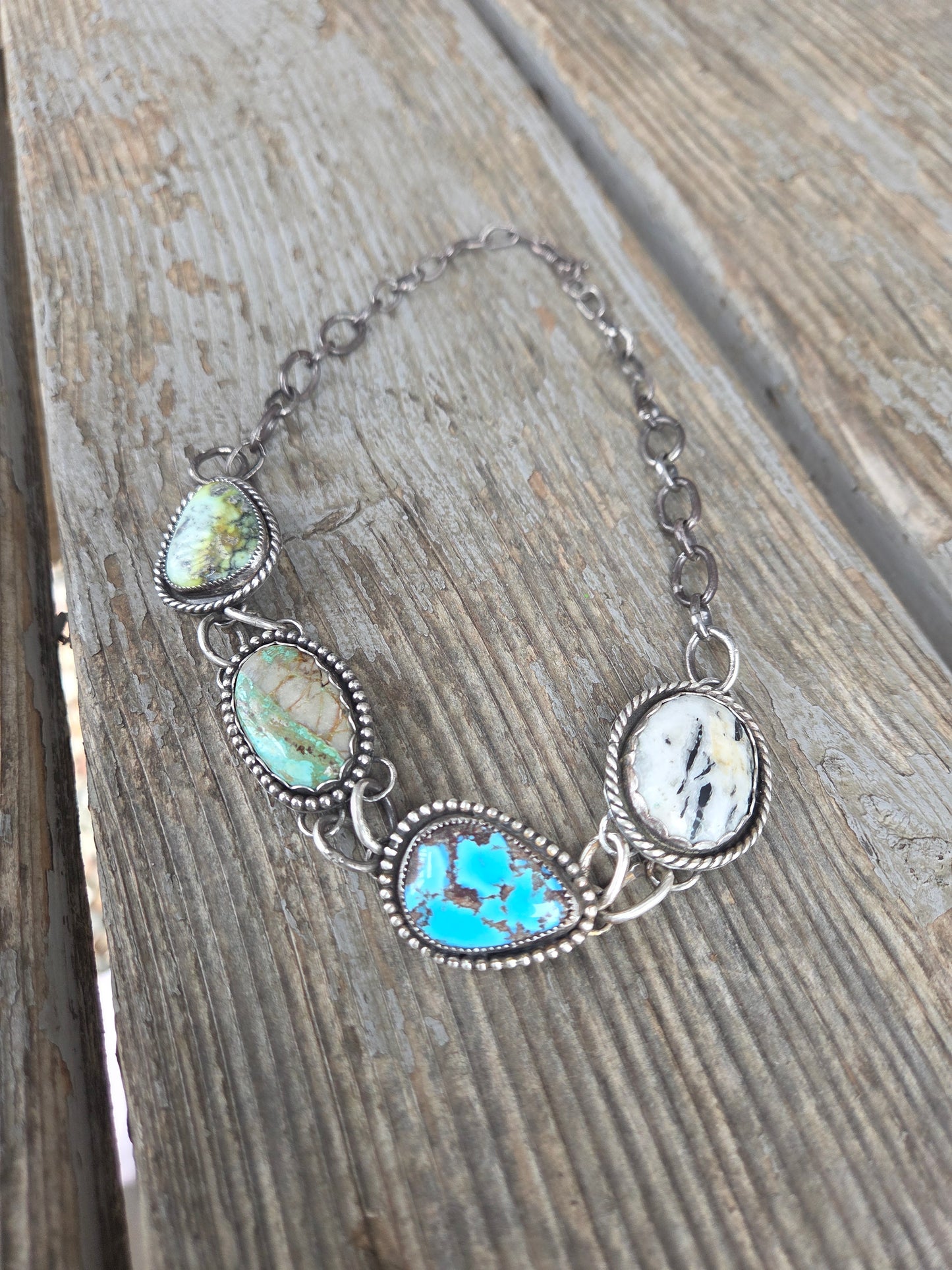 Choker• Golden Hills• Palomino • Boulder Turquoise• White Buffalo • Adjustable up to 15 inches. There is a small Crack in the bolder stone.