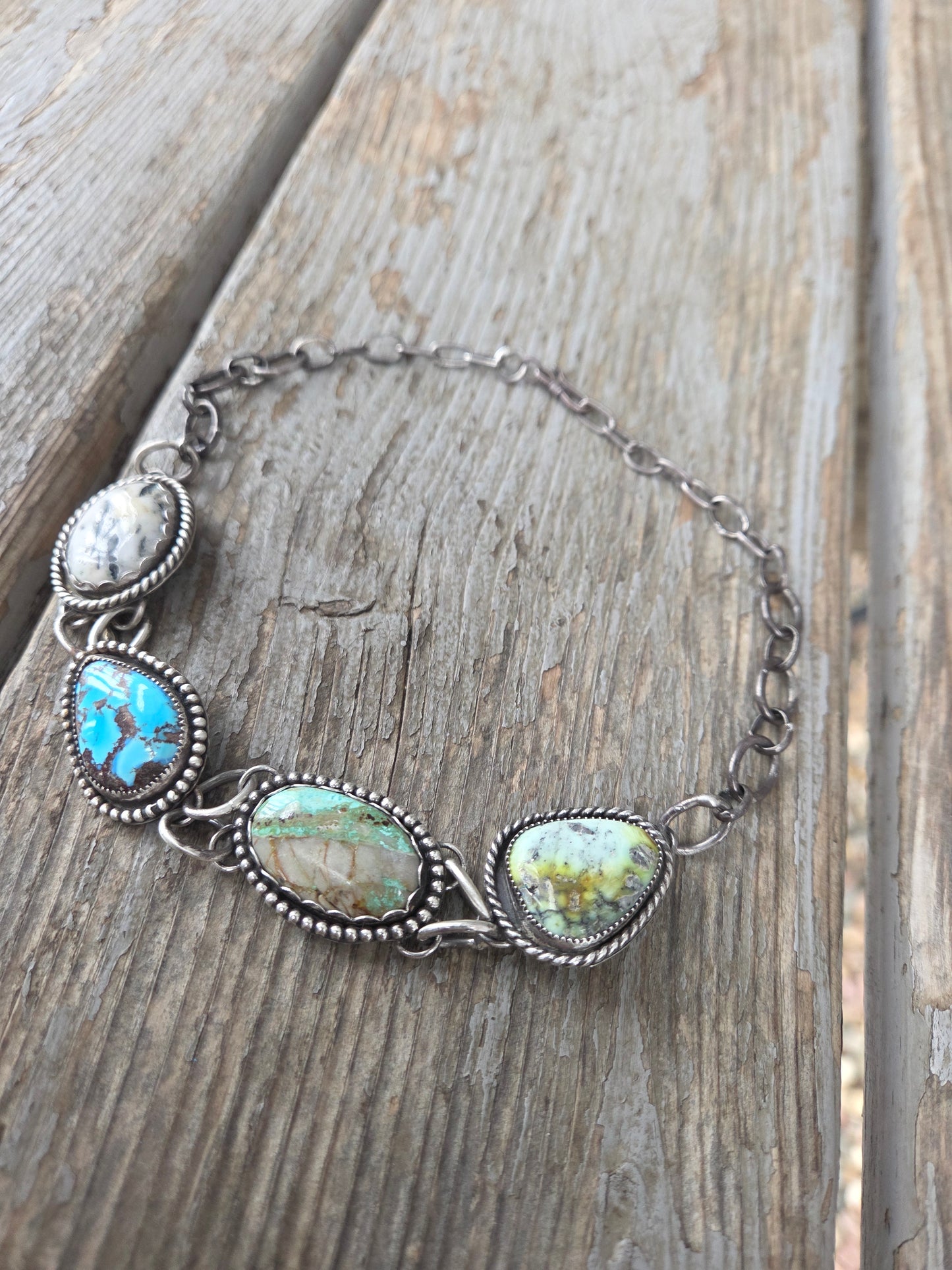 Choker• Golden Hills• Palomino • Boulder Turquoise• White Buffalo • Adjustable up to 15 inches. There is a small Crack in the bolder stone.