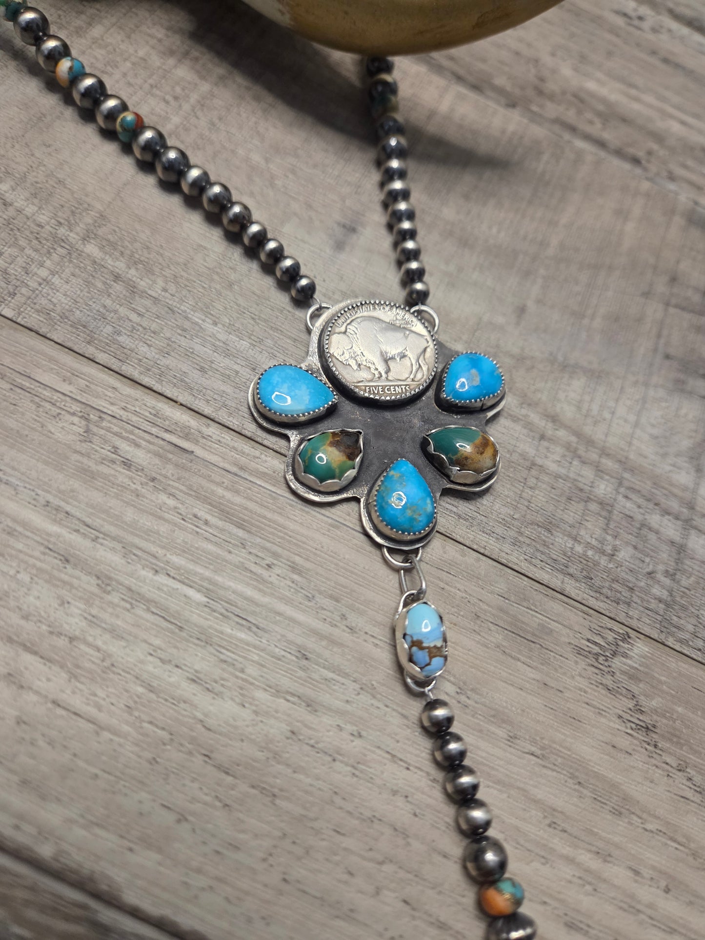 Buffalo Coin• Blue Bird Turquoise • Kingsmen Turquoise • Golden Hills Turquoise. Sterling Pearls & Spiny Oyster Kingsmen